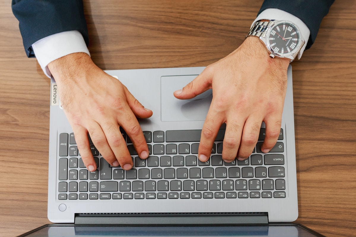 Compliance professional working on regulatory documentation
